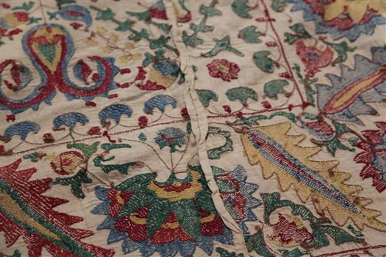 A late 19th century / early 20th century Caucasian directional patterned Suzani, 235cm x 170cm